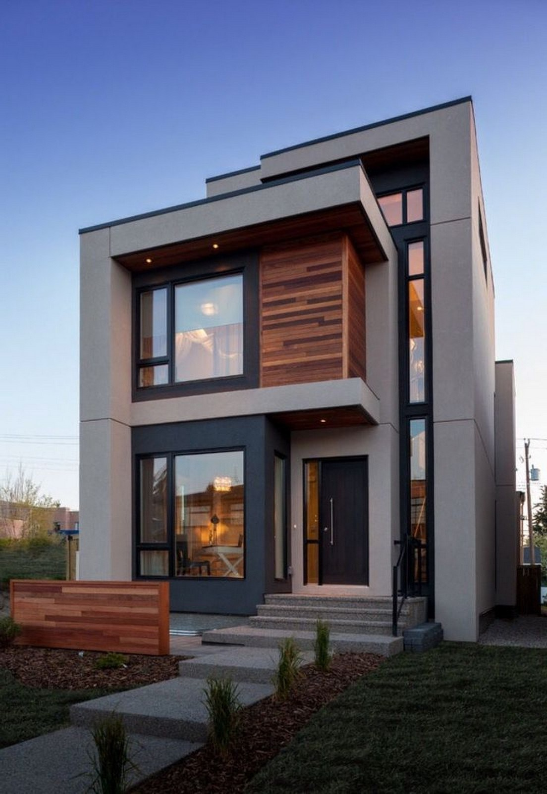 Modern designed flat roof, with stucco and wood panel, aluminum and glass windows, stamped concrete with finished landscape!